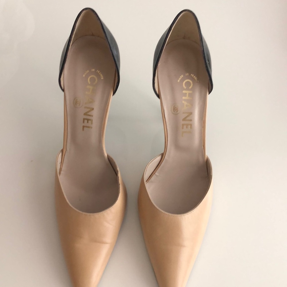 Chanel nude and black high heels